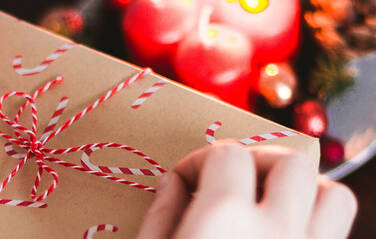 Christmas parcel being unwrapped